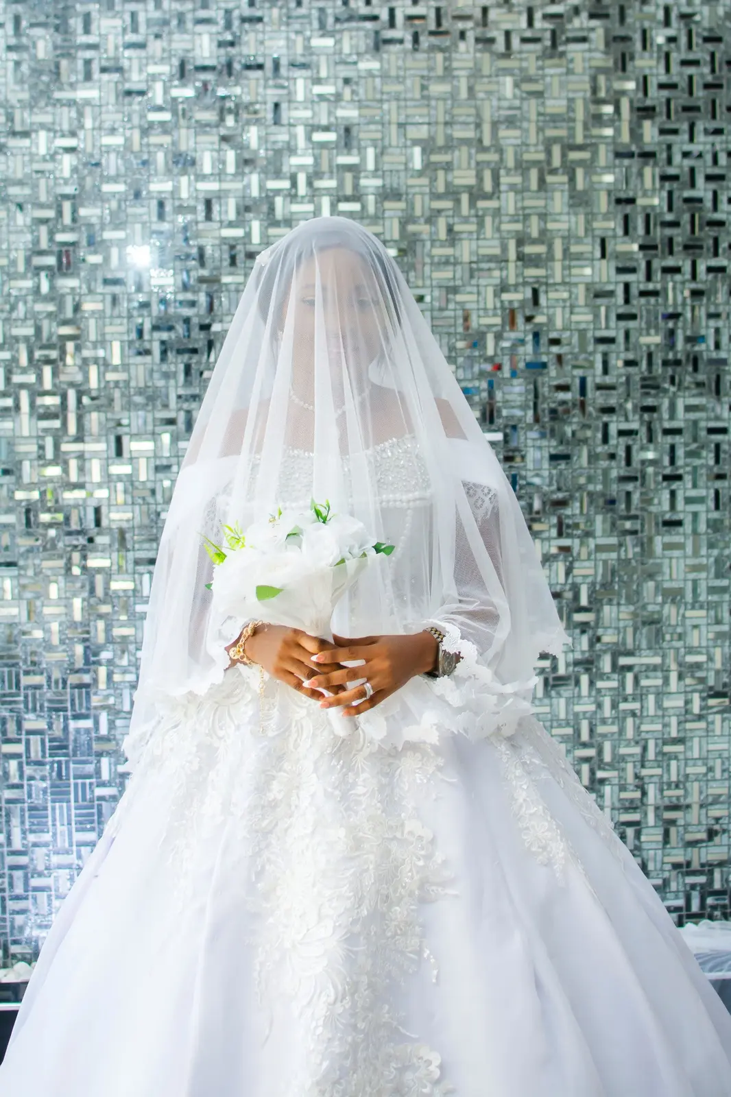 Bridal veil and bouquet detail photograph
